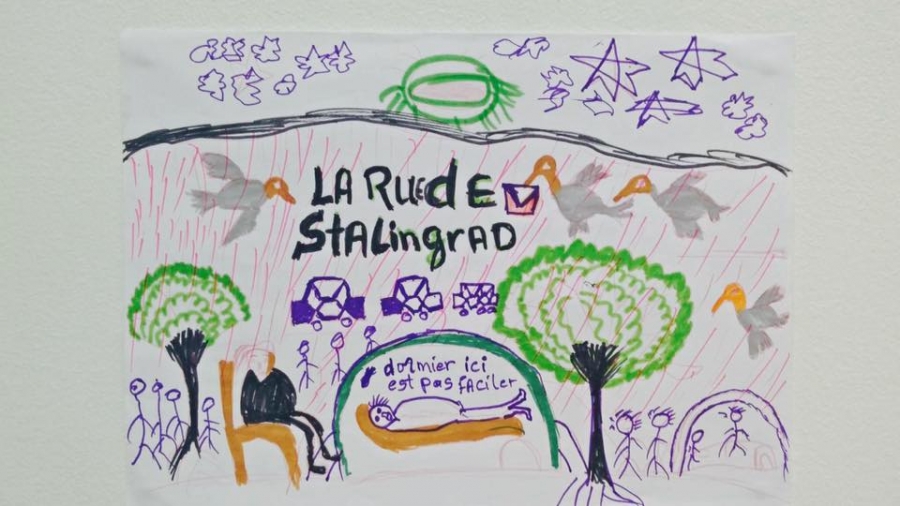 A child's drawing of a kid sleeping in a small tent on a Paris street with the words "sleeping here is not easy."